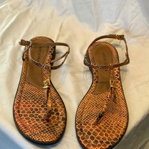 Copper animal print sandal flats.